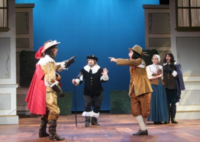 Actors playing a scene from The Liar by David Ives, adapted from the comedy by Pierre Corneille
